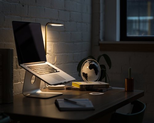 Cozy ergonomic workspace with warm ambient lighting